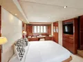 ALLY Princess V65 - master cabin bed and TV ALLY Princess V65 - master cabin bed and TV