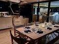 AMAYA Sunreef 60 - alfresco dining set up AMAYA Sunreef 60 - alfresco dining set up