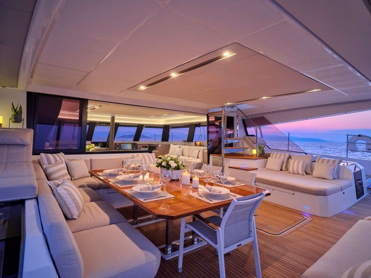 ALEXANDRA II Fountaine Pajot Alegria 67 - aft deck alfresco dining set up ALEXANDRA II Fountaine Pajot Alegria 67 - aft deck alfresco dining set up