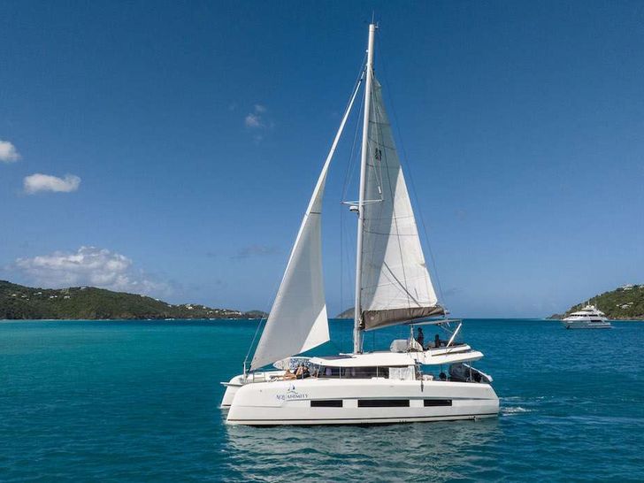 Aquanimity is your perfect charter option - a new model and stylish design. The yacht is equipped with four queen sized cabins,all with en-suite facilities and AC.This new model of Catamaran has an abundance of interior and exterior space with multip