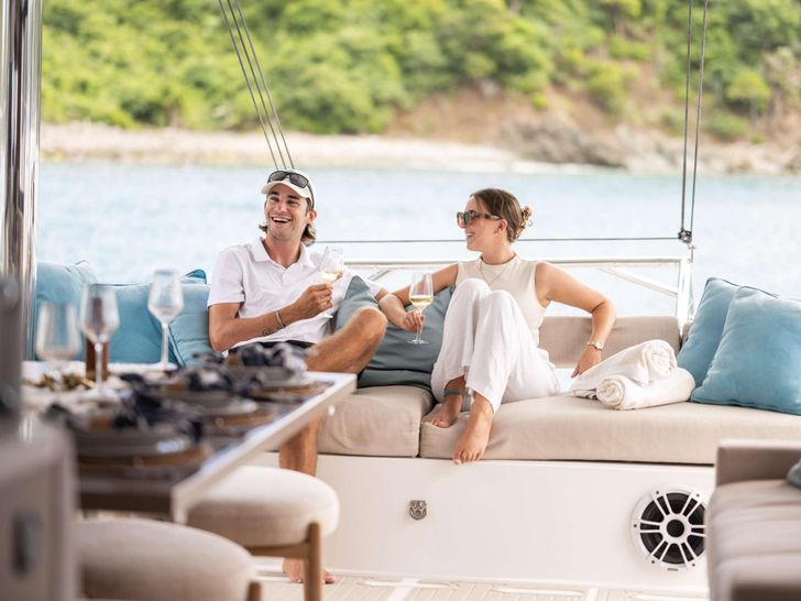 OCEANA Bali 4.8 - Guests Enjoying Aft Seating OCEANA Bali 4.8 - Guests Enjoying Aft Seating