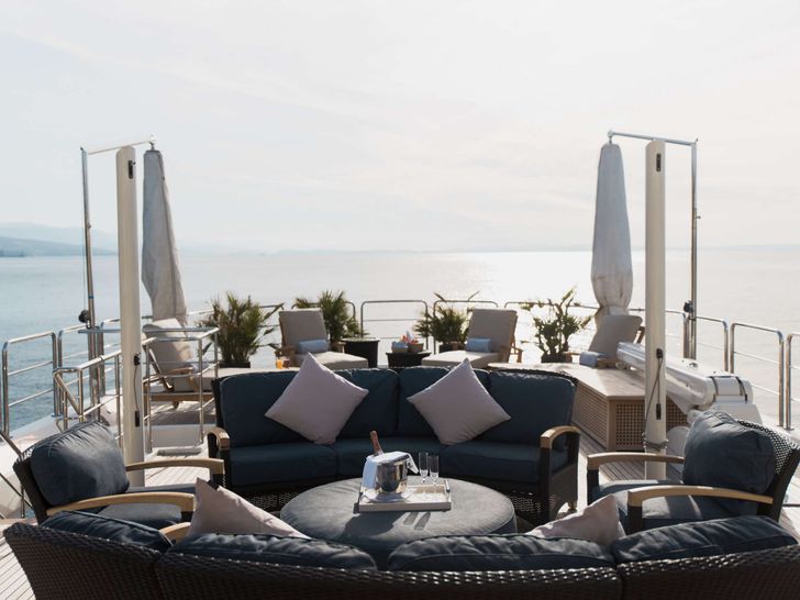 LADY TRUDY 43m CRN Luxury Crewed Motor Yacht Sundeck Seating Area LADY TRUDY 43m CRN Luxury Crewed Motor Yacht Sundeck Seating Area