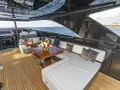 NO SURRENDER Riva Dolcevita 110 - sundeck shaded lounge with a dining table NO SURRENDER Riva Dolcevita 110 - sundeck shaded lounge with a dining table