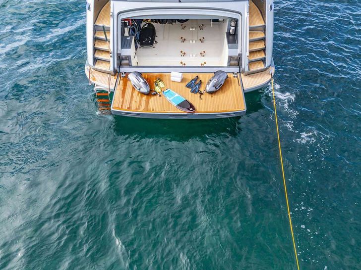 NO SURRENDER Riva Dolcevita 110 - aft shot with the water toys on the swim platform NO SURRENDER Riva Dolcevita 110 - aft shot with the water toys on the swim platform