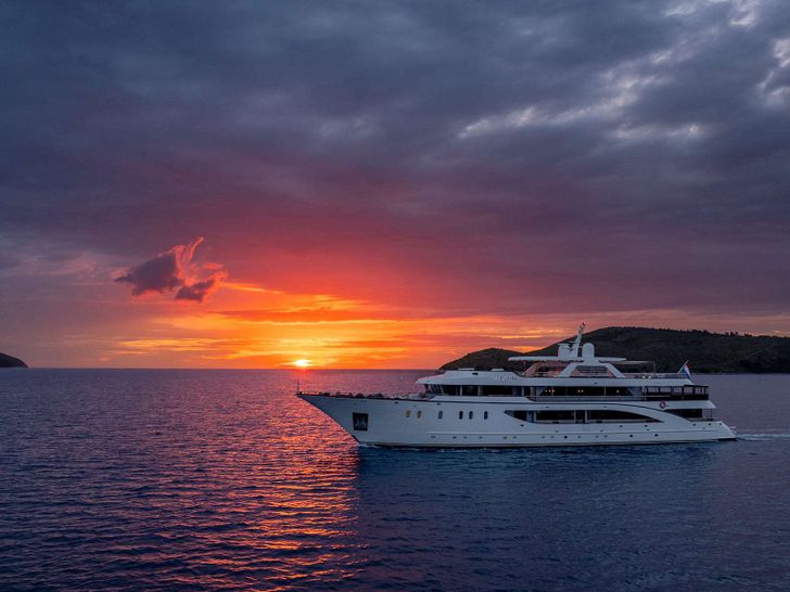 CRISTAL Custom 49m - anchored under the sunset CRISTAL Custom 49m - anchored under the sunset