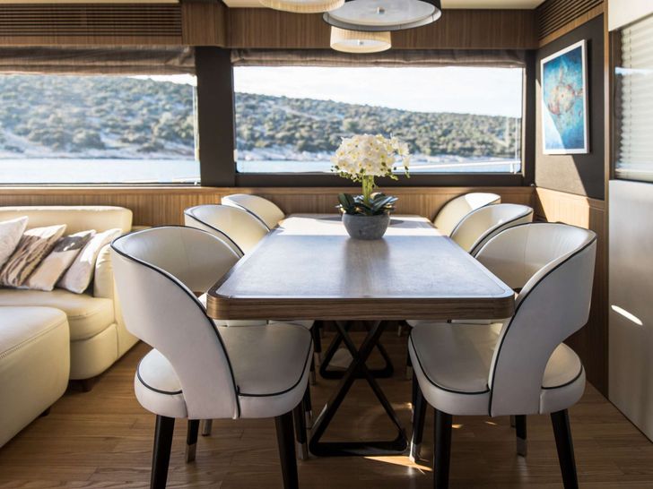 BOLLINGER Azimut Magellano 66 Crewed Motor Yacht Dining BOLLINGER Azimut Magellano 66 Crewed Motor Yacht Dining