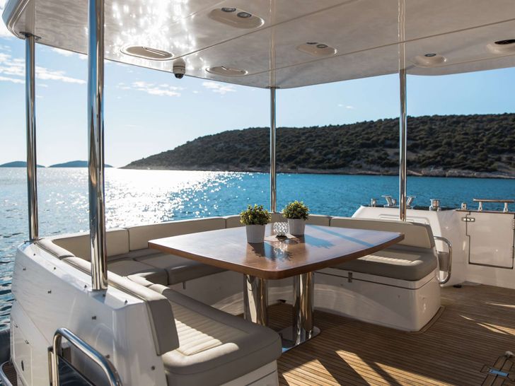 BOLLINGER Azimut Magellano 66 Crewed Motor Yacht Al fresco Dining Area BOLLINGER Azimut Magellano 66 Crewed Motor Yacht Al fresco Dining Area