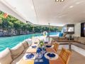 OLIVIA CHARLES Fountaine Pajot Ipanema 58 - alfresco dining set up OLIVIA CHARLES Fountaine Pajot Ipanema 58 - alfresco dining set up