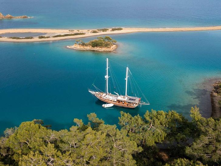 SERENAD A Custom Build 75 Gulet - anchored near an island SERENAD A Custom Build 75 Gulet - anchored near an island