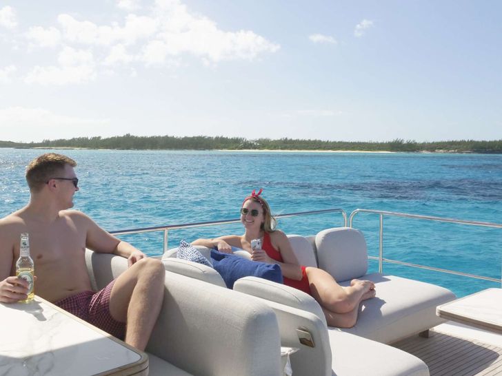 LIQUID ASSET - Azimut 66,flybridge with guest couple LIQUID ASSET - Azimut 66,flybridge with guest couple