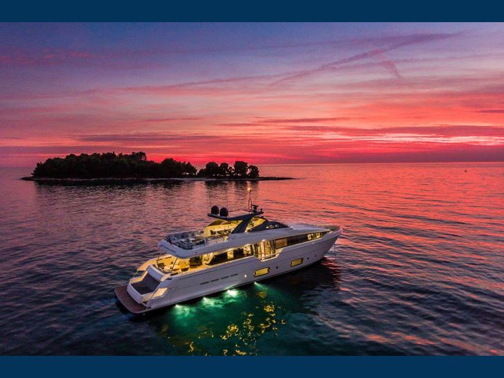 DAMARI Ferretti 960 anchored under the sunset