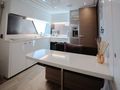 BONUS ROUND Ferretti Custom Line Navetta 28 - galley wide view BONUS ROUND Ferretti Custom Line Navetta 28 - galley wide view