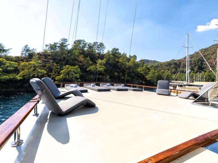 CAUSTIC 40m Custom Gulet Sunbathing Area CAUSTIC 40m Custom Gulet Sunbathing Area