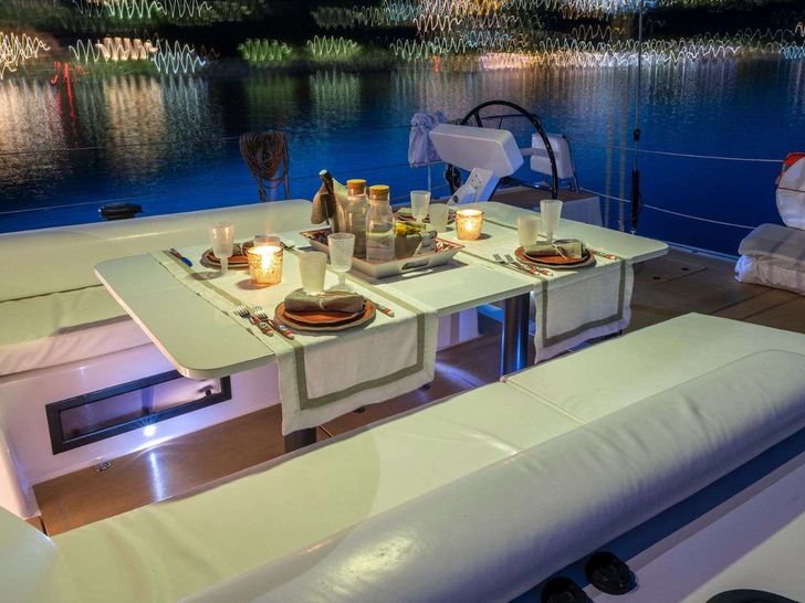PURA FOLLIA Felci Yacht Design 60 - upper deck alfresco dining area PURA FOLLIA Felci Yacht Design 60 - upper deck alfresco dining area