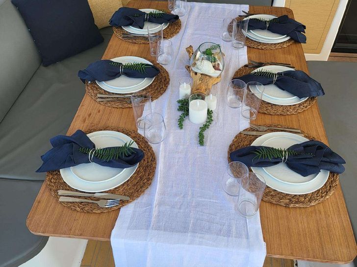 DOLCE VITA Dufour 48 - aft deck dining set up DOLCE VITA Dufour 48 - aft deck dining set up