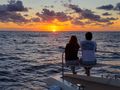 AEOLUS 77 Lagoon 77 - guests under the sunset AEOLUS 77 Lagoon 77 - guests under the sunset