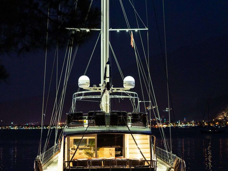QUEEN OF MAKRI Custom Sailing Yacht 40m - docked at night QUEEN OF MAKRI Custom Sailing Yacht 40m - docked at night