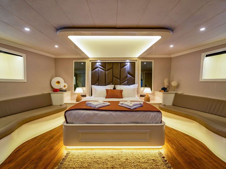 QUEEN OF MAKRI Custom Sailing Yacht 40m - master cabin bed and seating QUEEN OF MAKRI Custom Sailing Yacht 40m - master cabin bed and seating