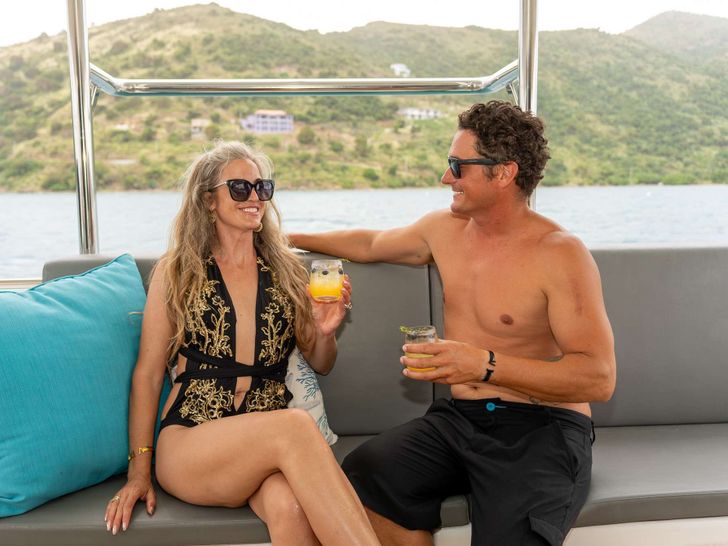 SERENITY Dufour 48 - guests enjoying cocktails SERENITY Dufour 48 - guests enjoying cocktails