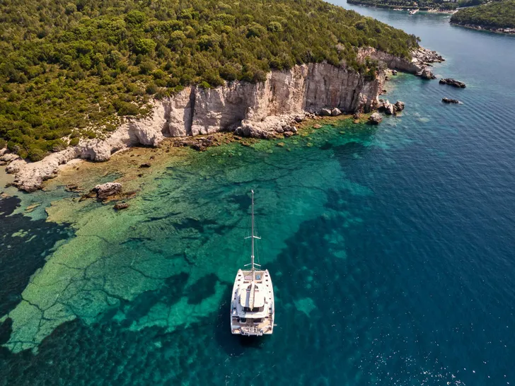 AZUL Lagoon 55 - aerial shot while anchored near an island AZUL Lagoon 55 - aerial shot while anchored near an island
