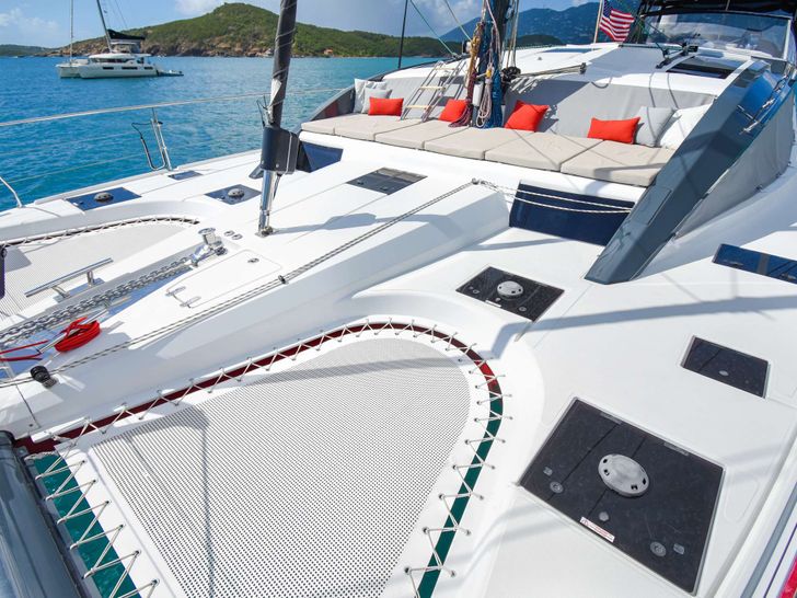 ROGUE - foredeck bronzing area with trampoline panoramic shot