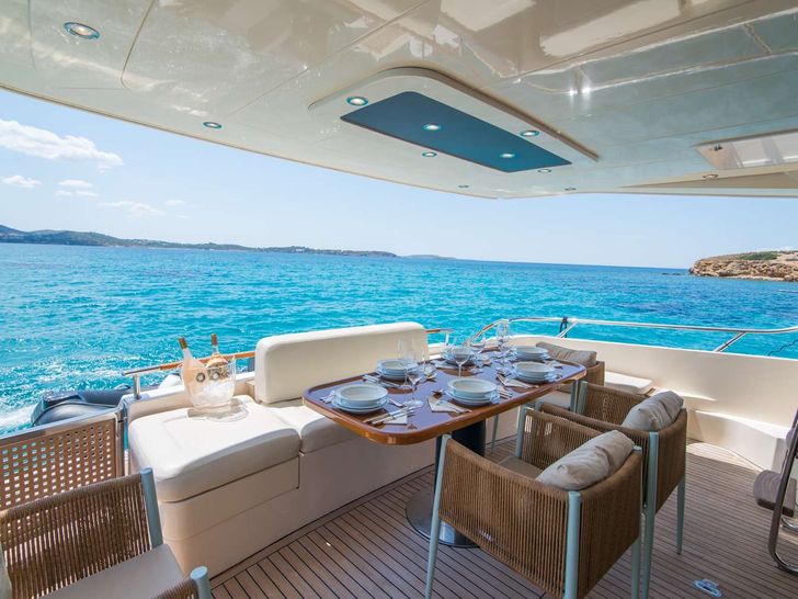 ANTAMAR II Riva Dolcevita 70 - aft deck dining area ANTAMAR II Riva Dolcevita 70 - aft deck dining area