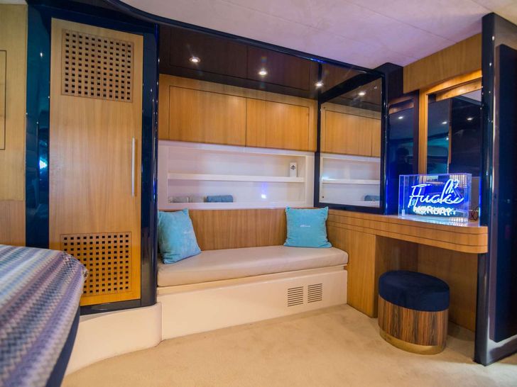 ANTAMAR II Riva Dolcevita 70 - master cabin seating and vanity area ANTAMAR II Riva Dolcevita 70 - master cabin seating and vanity area