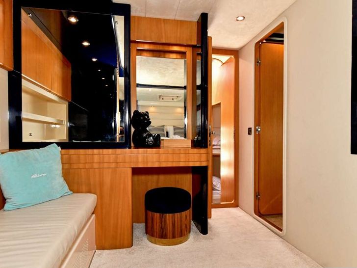 ANTAMAR II Riva Dolcevita 70 - master cabin seating and vanity area ANTAMAR II Riva Dolcevita 70 - master cabin seating and vanity area