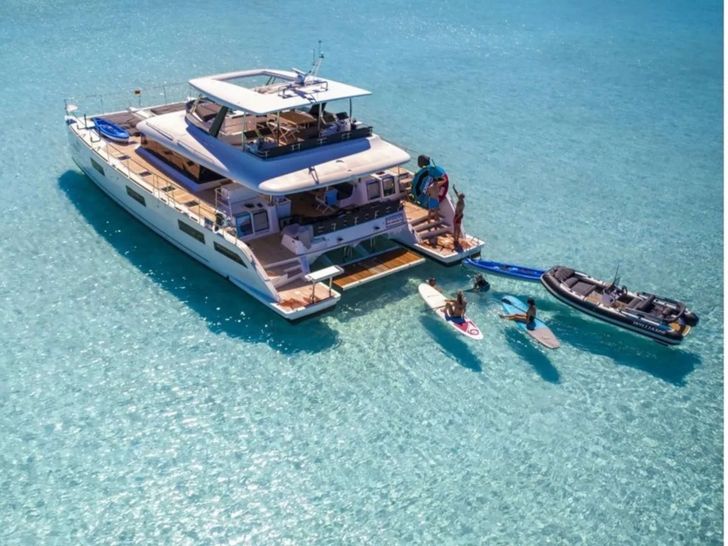 SERENITY Lagoon 630 - Aerial Aft Shot With Water Toys SERENITY Lagoon 630 - Aerial Aft Shot With Water Toys