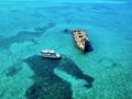 GO-N-HOT - aerial shot with a shipwreck