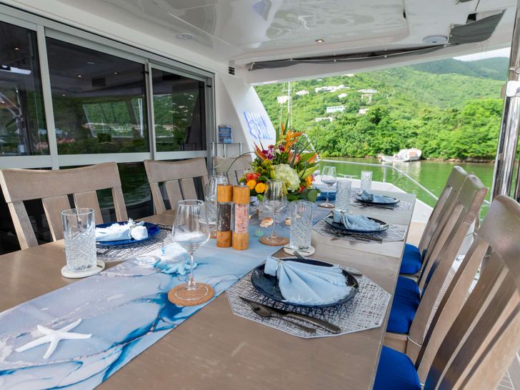 RUBY ONE Leopard 58 - aft deck dining table RUBY ONE Leopard 58 - aft deck dining table