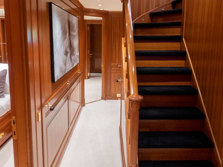 ALMYRA II - Perini Navi 164,hallway to lower cabins and staircase ALMYRA II - Perini Navi 164,hallway to lower cabins and staircase
