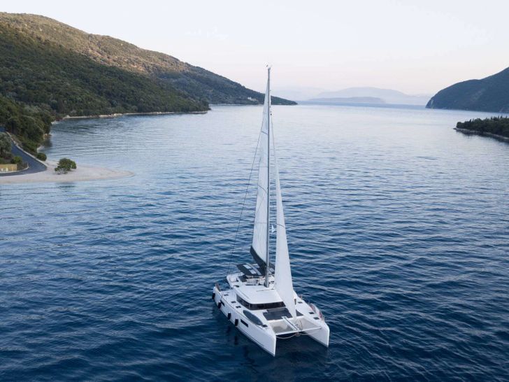 Lagoon 52F:Introducing our brand new Lagoon 52,offered for catamaran charter in Greece,in the Ionian Sea. Available for crewed charter! Our experienced and friendly crew promise to offer you the best sailing experience. Equipped with a hydraulic platf