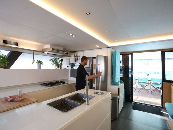 LIR Fountaine Pajot Victoria 67 - Chef in the Galley LIR Fountaine Pajot Victoria 67 - Chef in the Galley