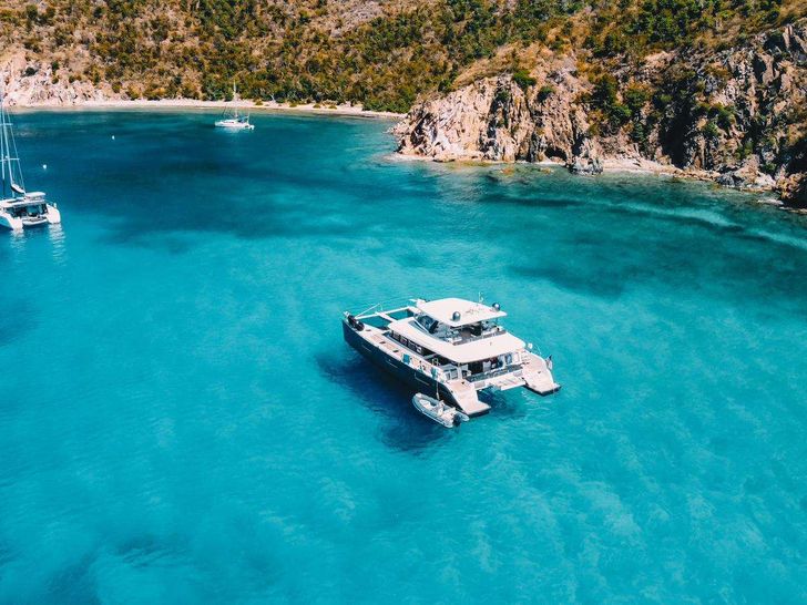 MARE BLU Lagoon 630 - Anchored Aerial Shot MARE BLU Lagoon 630 - Anchored Aerial Shot