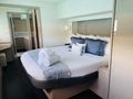 TRU NORTH Fountaine Pajot Alegria 67 Crewed Catamaran Master Cabin and Bath TRU NORTH Fountaine Pajot Alegria 67 Crewed Catamaran Master Cabin and Bath