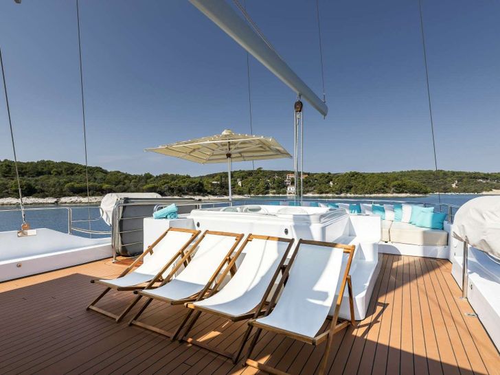 OMNIA Brodosplit 46m Crewed Motor Sailer Sunbathing OMNIA Brodosplit 46m Crewed Motor Sailer Sunbathing