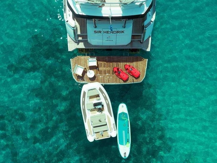 SIR HENDRIK Greenline 68 aerial aft shot with water toys SIR HENDRIK Greenline 68 aerial aft shot with water toys