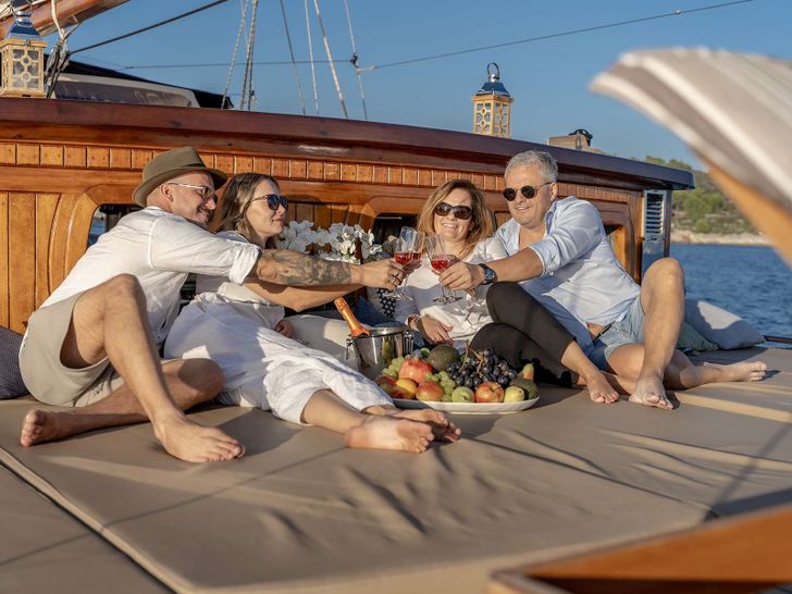 SMART SPIRIT Custom Gulet 25m - guests enjoying wine onboard SMART SPIRIT Custom Gulet 25m - guests enjoying wine onboard