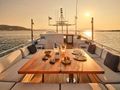 ALAYA - Lurssen 33 m,flybridge alfresco dining area under the sunset ALAYA - Lurssen 33 m,flybridge alfresco dining area under the sunset