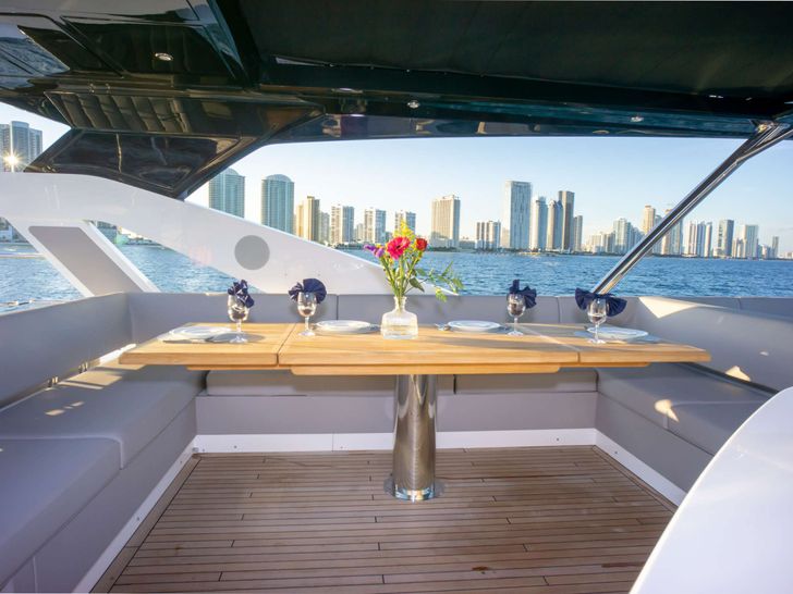 MILAMO Sunseeker 76 - flybridge dining MILAMO Sunseeker 76 - flybridge dining