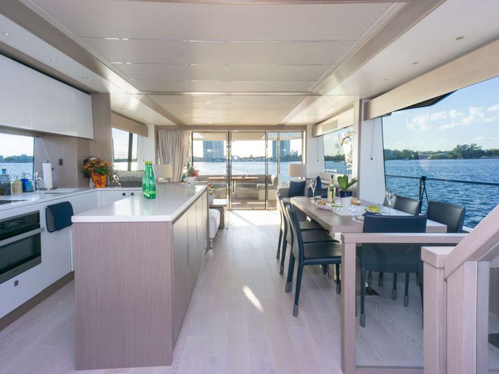 MILAMO Sunseeker 76 - indoor dining area and galley MILAMO Sunseeker 76 - indoor dining area and galley