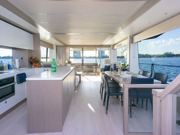 MILAMO - Sunseeker 76,indoor dining area and galley