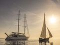 AURUM SKY - Custom Sailing Yacht 43m,anchored under the sunset
