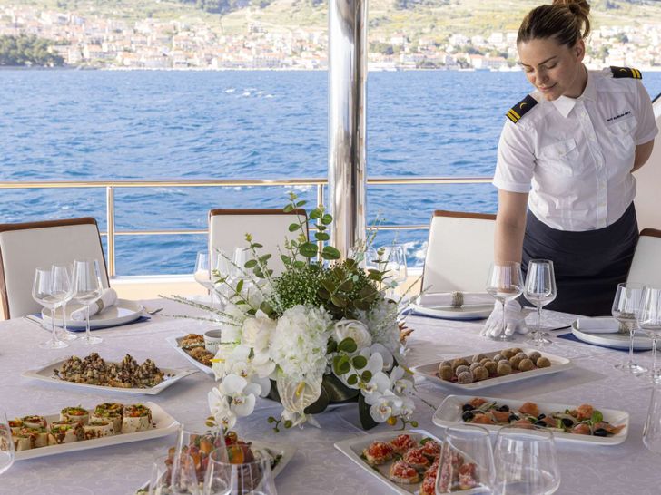 AURUM SKY - Custom Sailing Yacht 43m,alfresco dining set up AURUM SKY - Custom Sailing Yacht 43m,alfresco dining set up