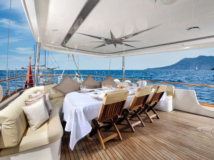 ALESSANDRO I Custom Sailing Yacht 40m - alfresco dining area ALESSANDRO I Custom Sailing Yacht 40m - alfresco dining area