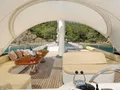 ALESSANDRO I Custom Sailing Yacht 40m - flybridge lounge and dining area ALESSANDRO I Custom Sailing Yacht 40m - flybridge lounge and dining area