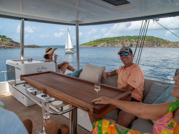 ISLAND HOPPIN 55 Lagoon 55 - guests on the flybridge ISLAND HOPPIN 55 Lagoon 55 - guests on the flybridge