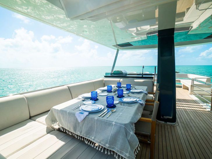 NORMAN`S T4 Sirena 68 - flybridge dining area NORMAN`S T4 Sirena 68 - flybridge dining area