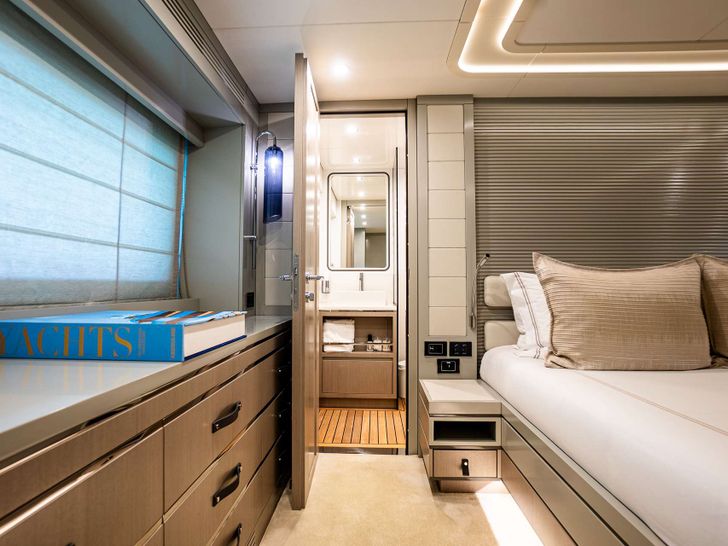 NORMAN`S T4 Sirena 68 - master cabin bed and entrance to the bathroom NORMAN`S T4 Sirena 68 - master cabin bed and entrance to the bathroom